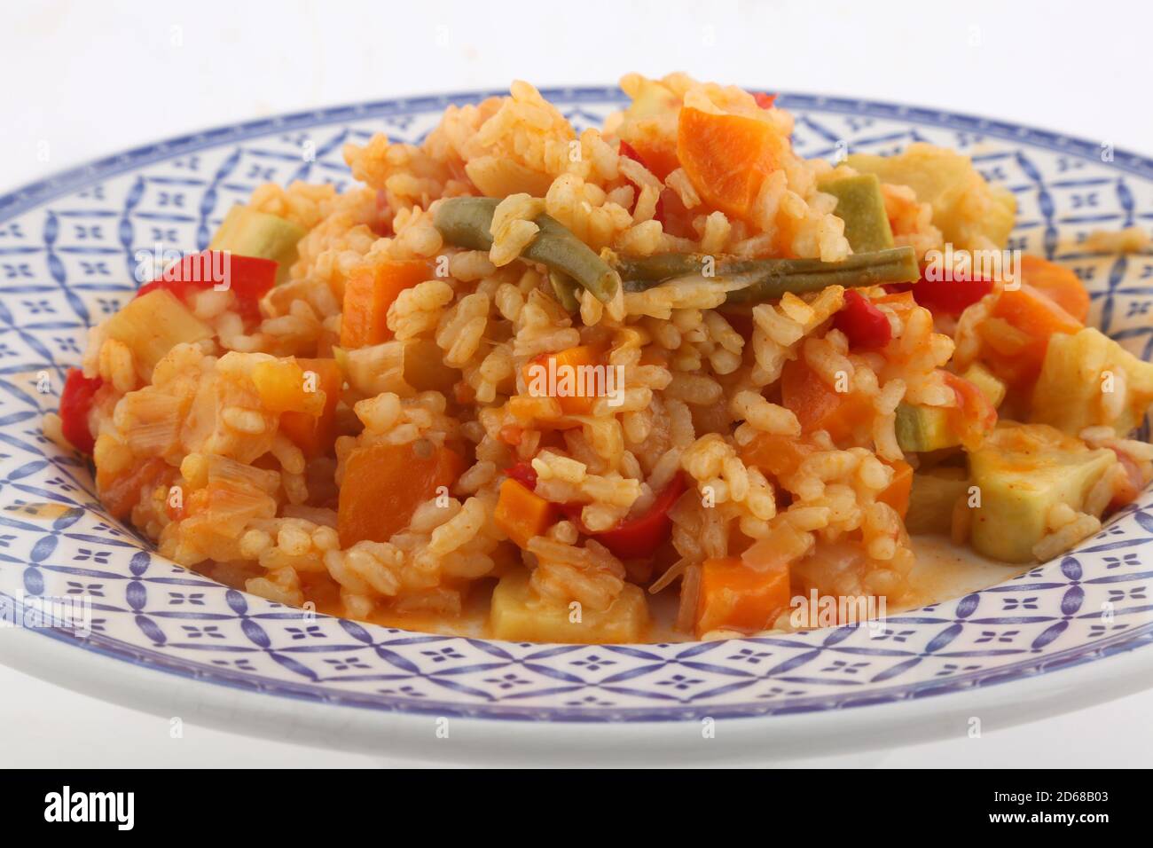 Reis mit Paprika Karotten und Gemüse als veganes Essen Stockfoto