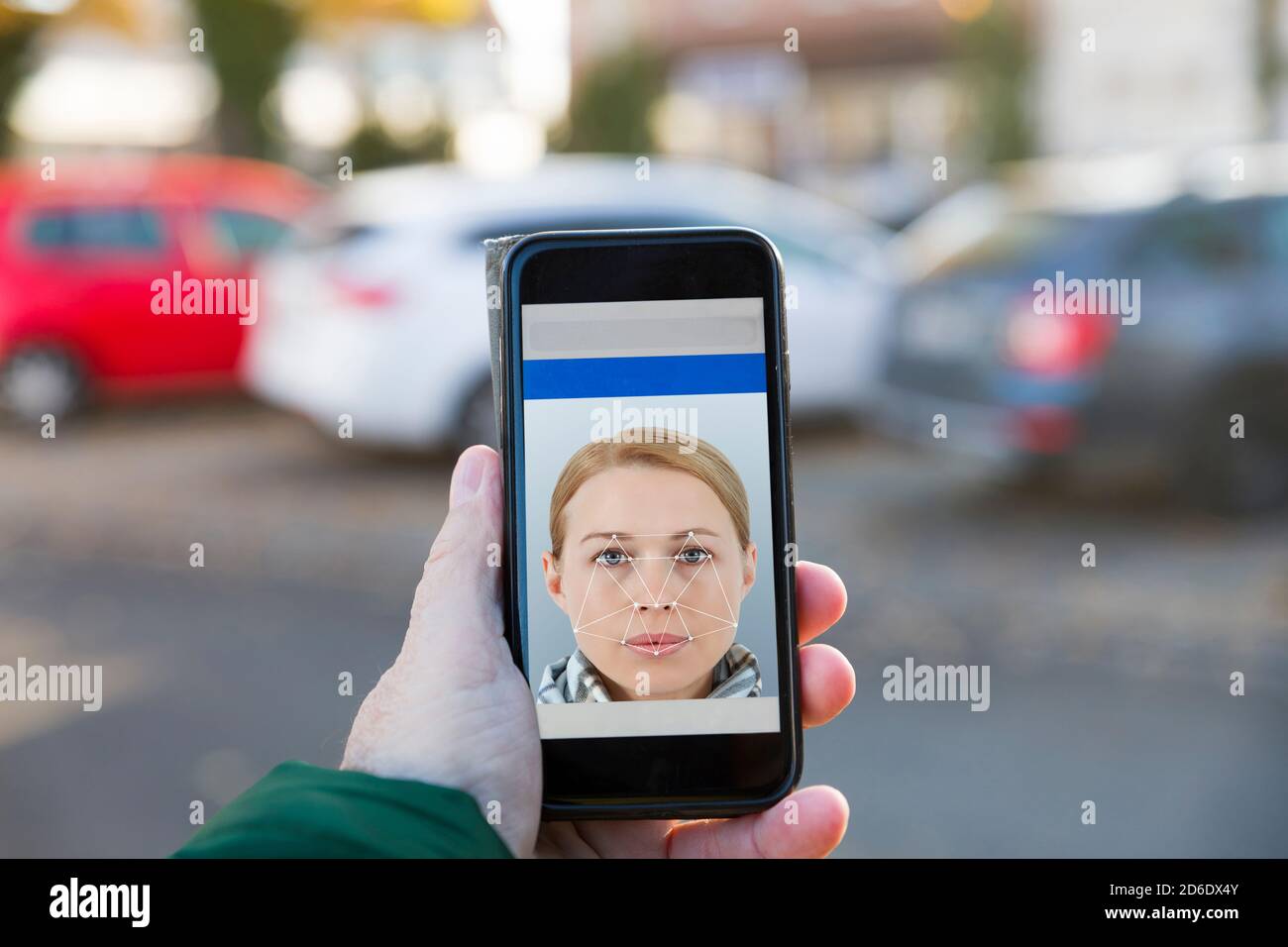 Hand, Smartphone, Gesichtserkennungsprogramm Stockfoto