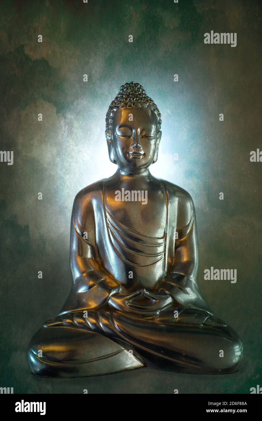 Eine hübsche sitzende Buddha-Statue Stockfoto