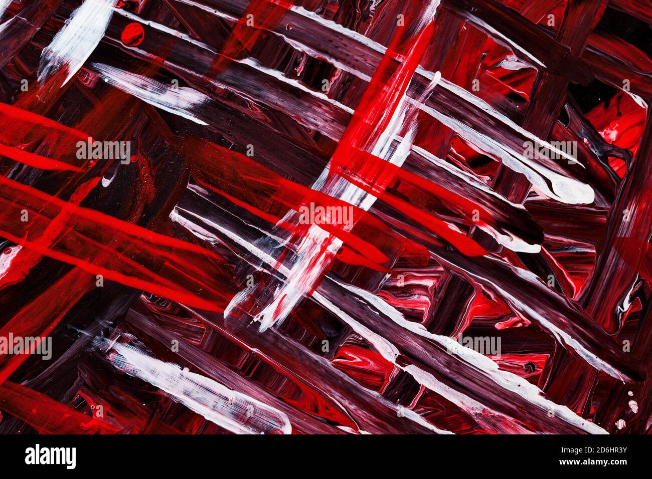 Rote, weiße und schwarze Pinselstriche. Ausdrucksstarker abstrakter Hintergrund. Handgezeichnete Textur Stockfoto