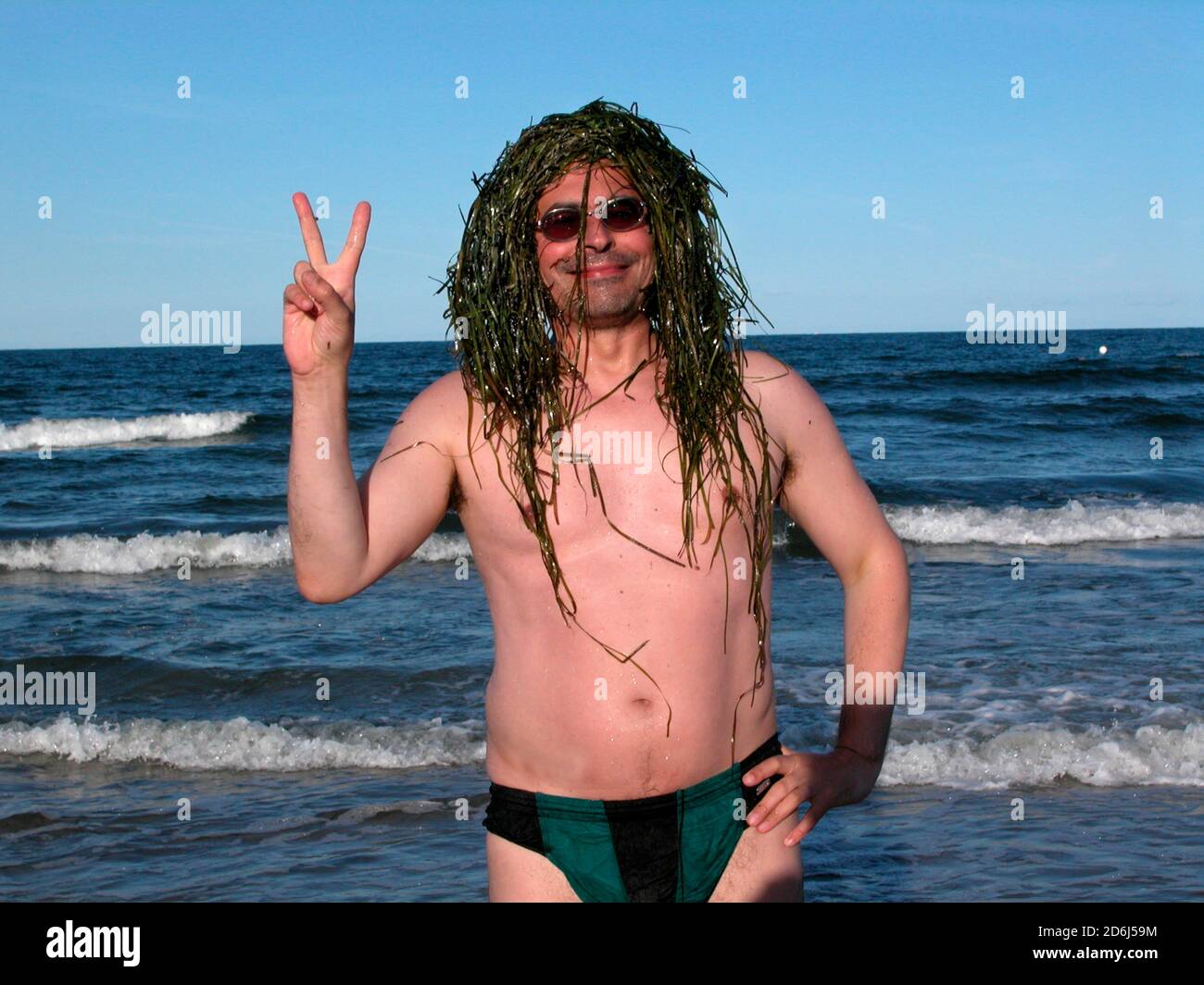 Hippie, Parodie, Haare aus Algen, Rügen, Ostsee Stockfoto