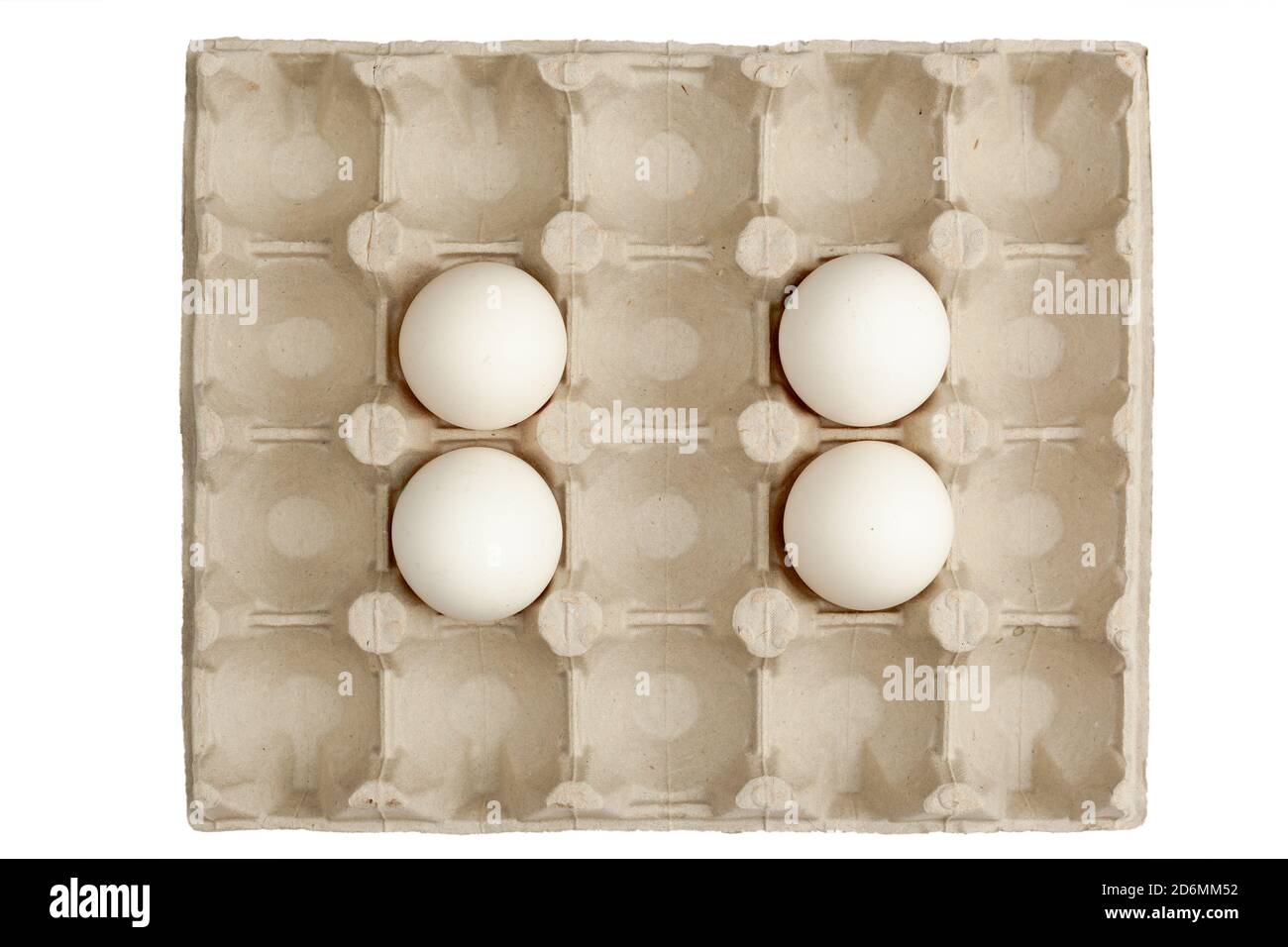 Käfig mit Hühnereiern Stockfoto