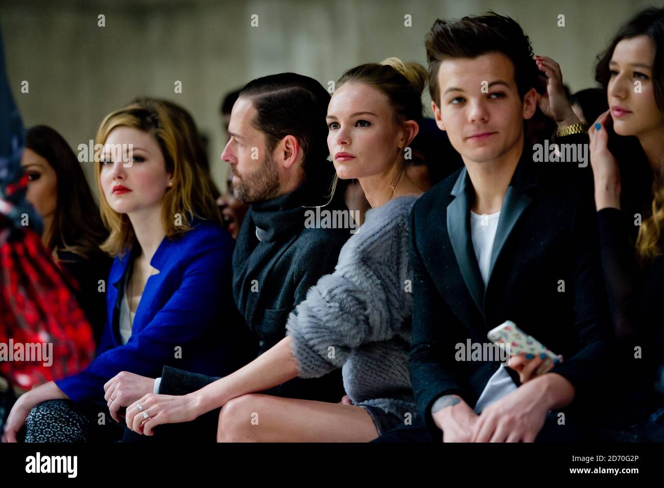 Michael Polish, Kate Bosworth, Louis Tomlinson, Eleanor Calder in der ersten Reihe im Top Shop Unique, während der Herbst/Winter 2013 Catwalk Show im Rahmen der London Fashion Week in der Tate Modern, London. Stockfoto