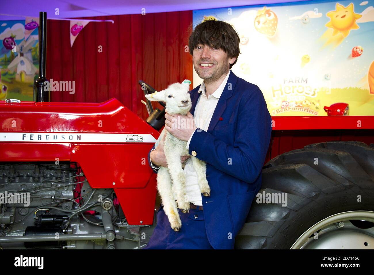 Alex James startet eine Pop-up-Farm in Canary Wharf, London, um Farm Heroes Saga zu starten - ein neues Spiel von den Machern von Candy Crush Saga. Stockfoto