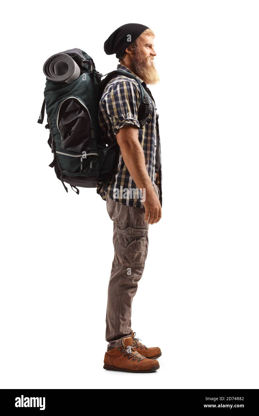 In voller Länge Profilaufnahme eines bärtigen Kerl Wanderer mit Ein Rucksack isoliert auf weißem Hintergrund Stockfoto