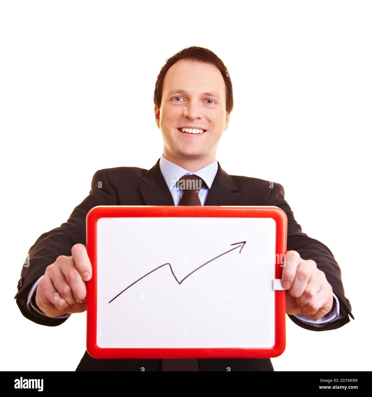 Geschäftsmann hält kleines Whiteboard mit einem Pfeil Stockfoto