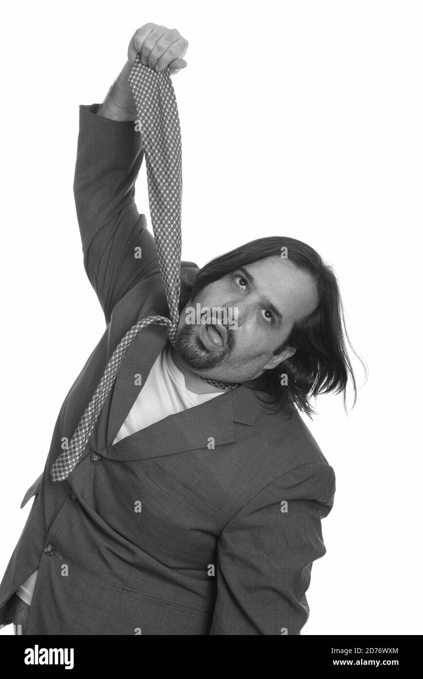 Fat kaukasischen Geschäftsmann seine eigene Riegel ziehen Stockfoto