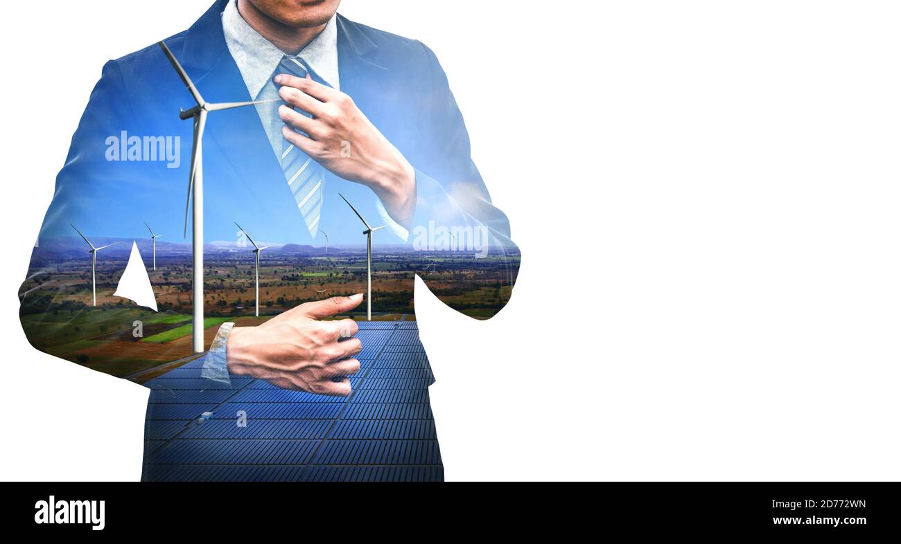 Doppelbelichtungsgrafik von Geschäftsleuten, die über Windturbinenpark und grüne Schnittstelle für Mitarbeiter aus erneuerbaren Energien arbeiten. Konzept der Nachhaltigkeit Stockfoto