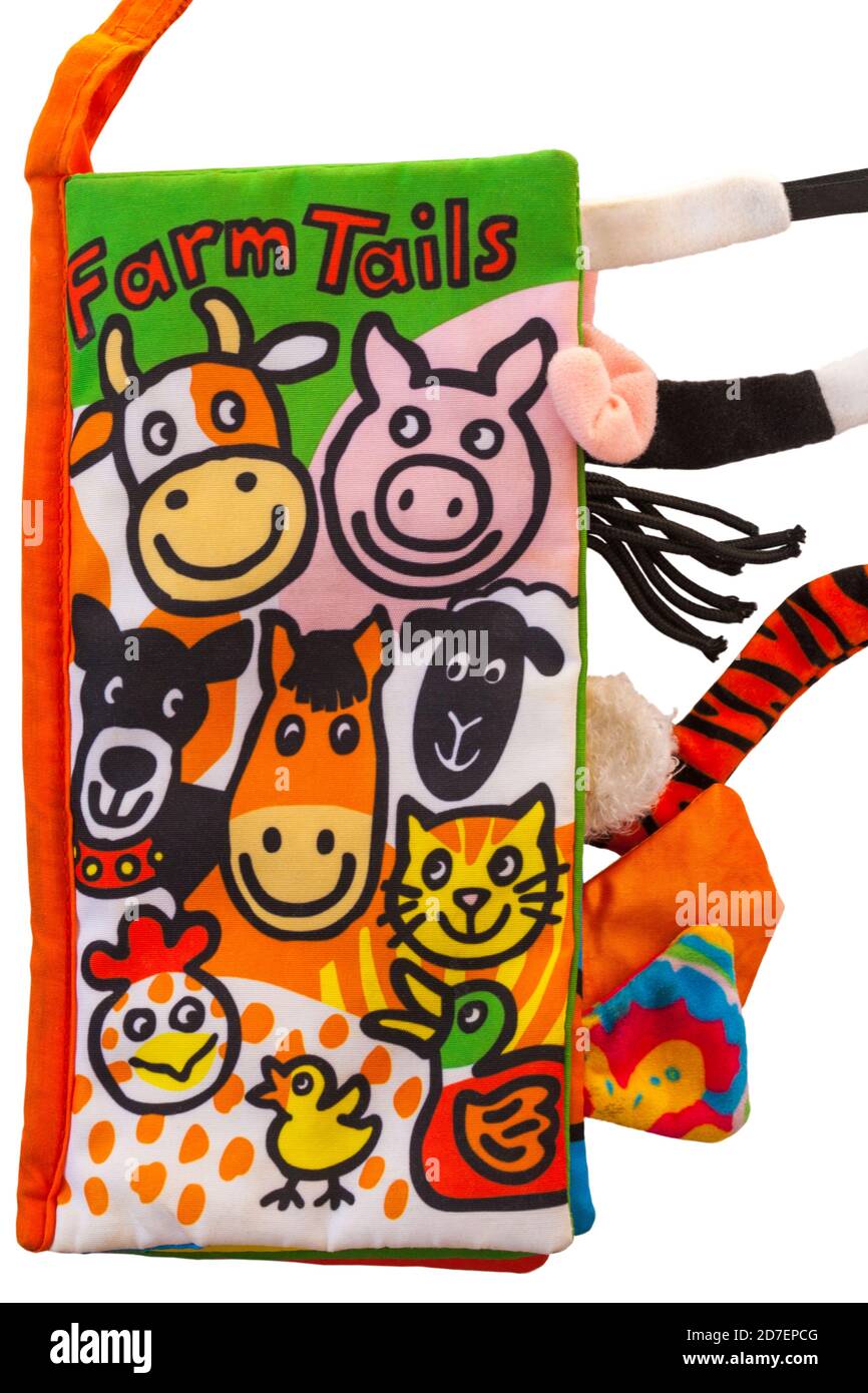 Young child's Farm Tails Stoffbuch auf weißem Hintergrund gesetzt Stockfoto