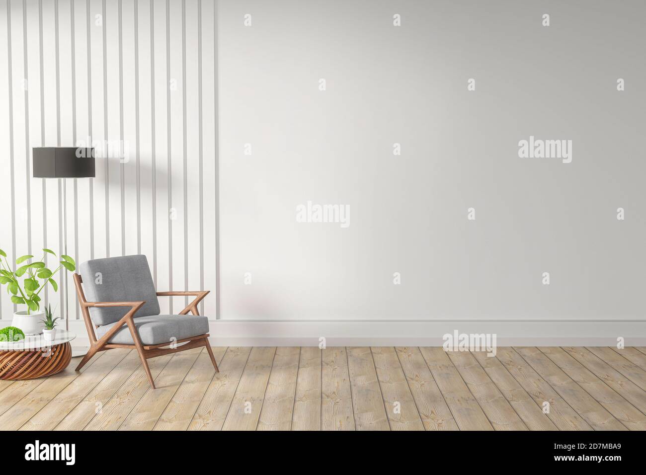 Grauer gemütlicher Stuhl neben einem kleinen Tisch mit Ein Buch und eine Pflanze darauf an einem Tag Zimmereinrichtung Stockfoto