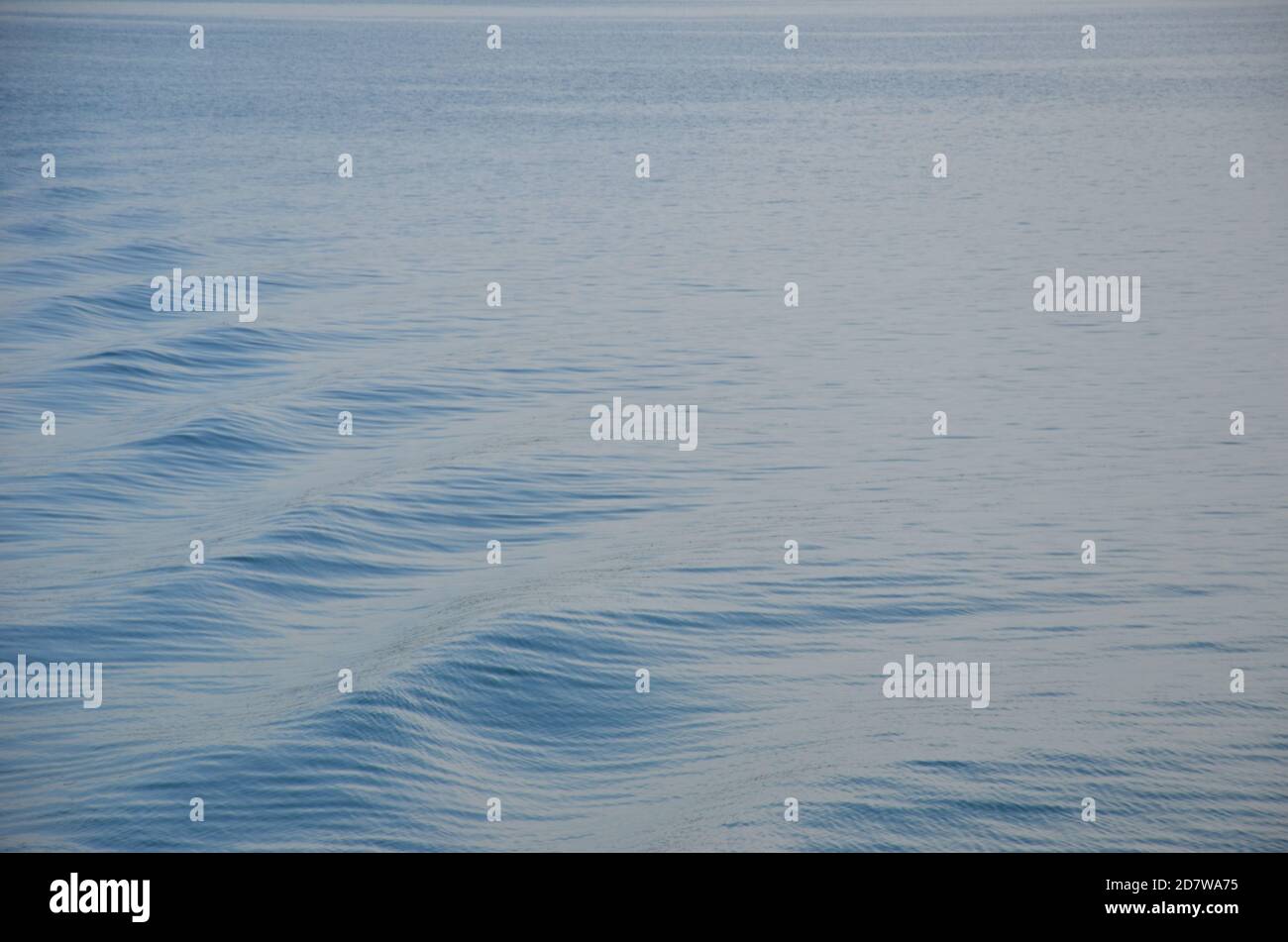 Wellen in ruhigem Wasser, Jervis Bay, NSW Stockfoto