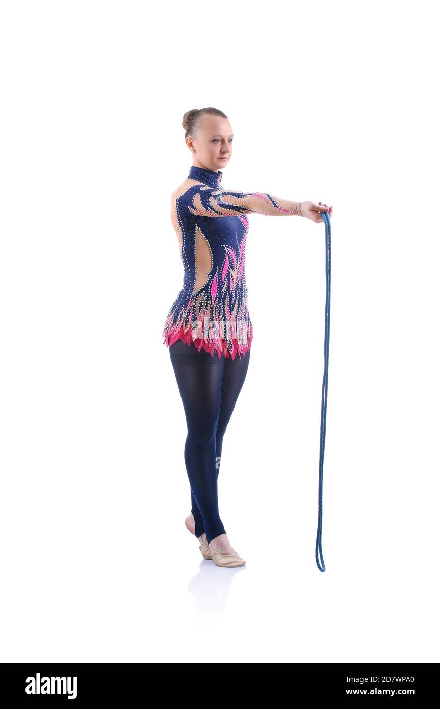 Schöne künstlerische weibliche Turnerin beim Ausarbeiten, Kunstturnen Element Stockfoto