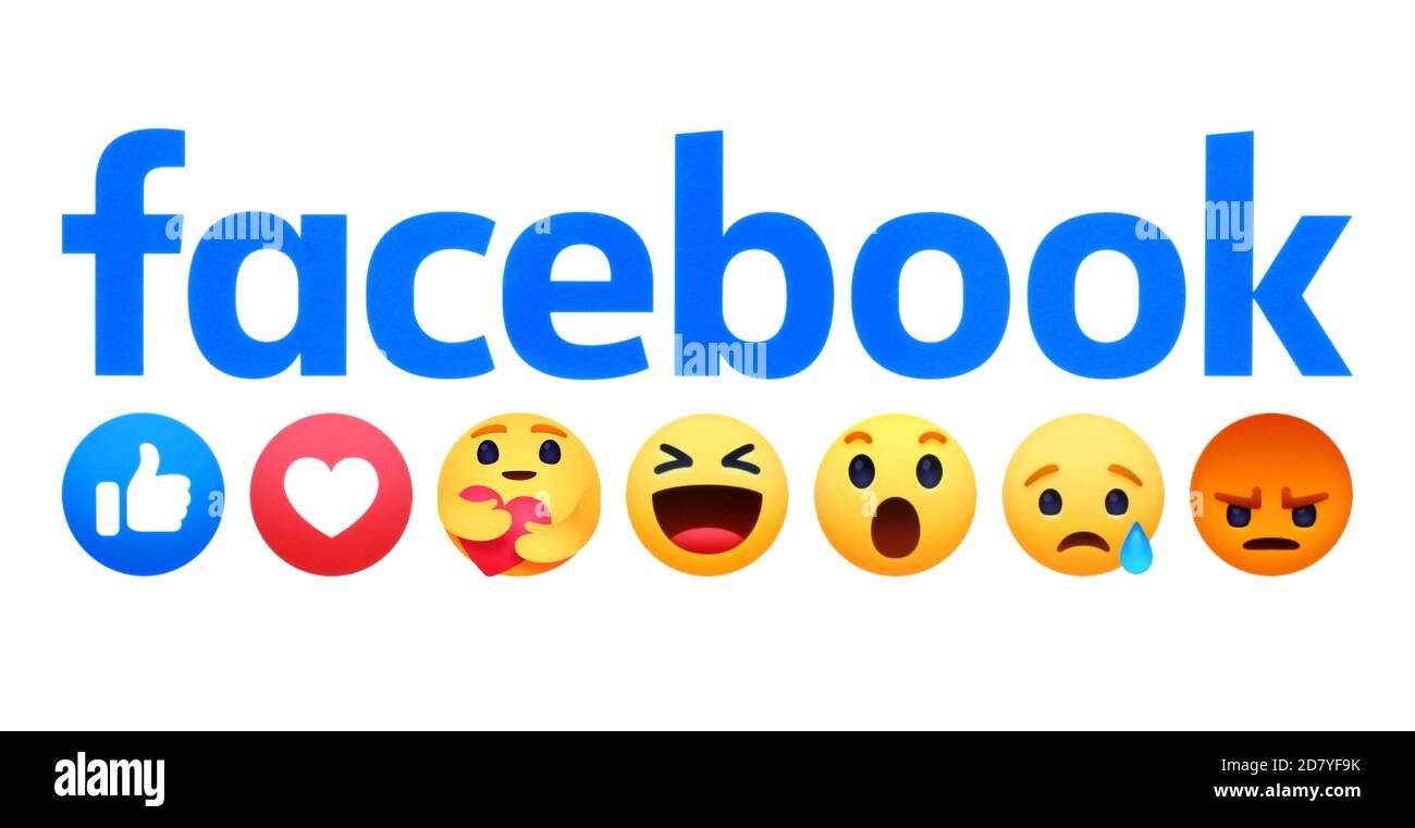 Kiew, Ukraine - 18. April 2020: Facebook-Logo mit neuem Like-Button empathische Emoji-Reaktionen, gedruckt auf weißem Papier. Facebook fügt eine Umarmung reacti Stockfoto