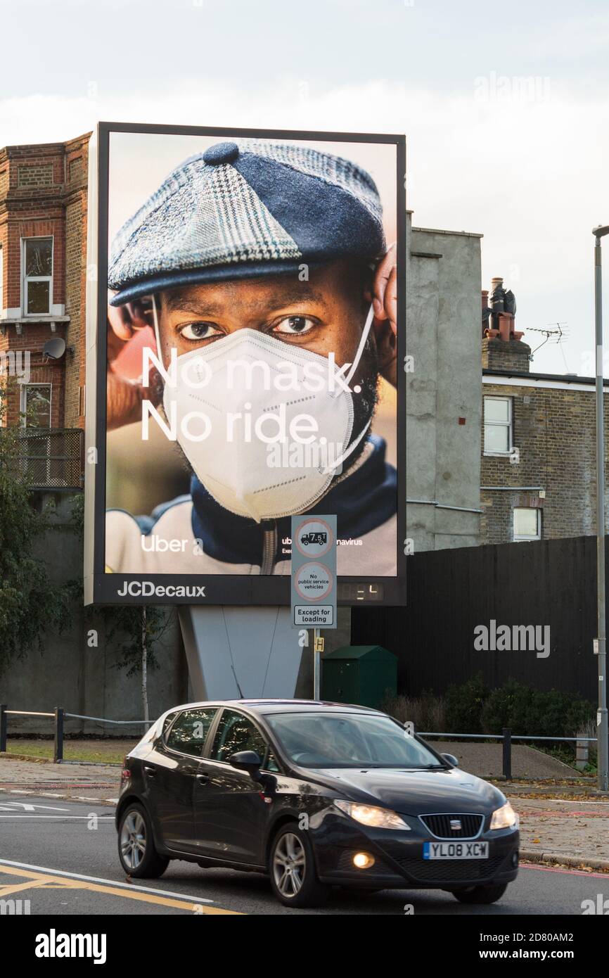 Uber - No Mask, No Ride Werbung in Wandsworth, Southwest London, UK Stockfoto