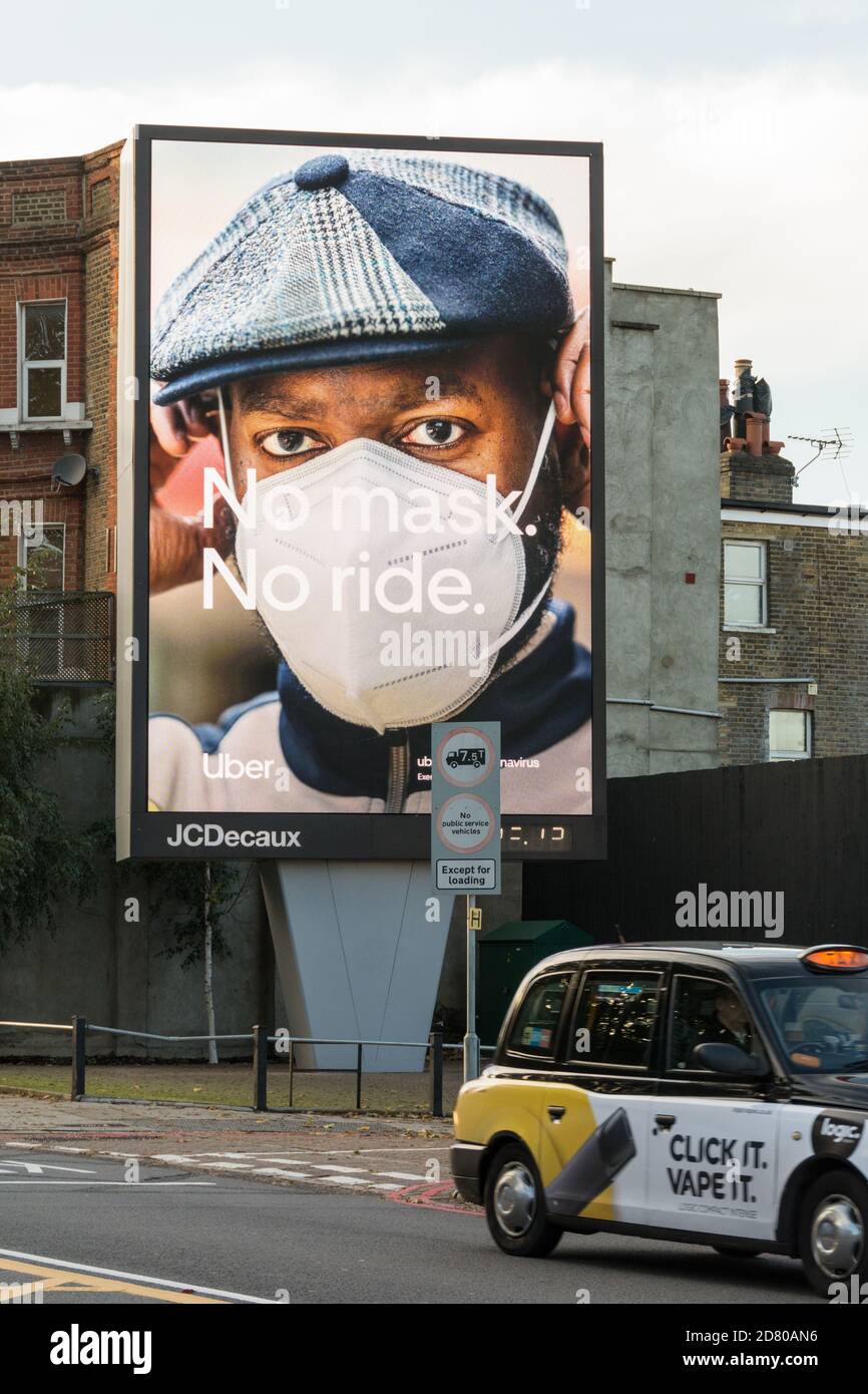 Uber - No Mask, No Ride Werbung in Wandsworth, Southwest London, UK Stockfoto
