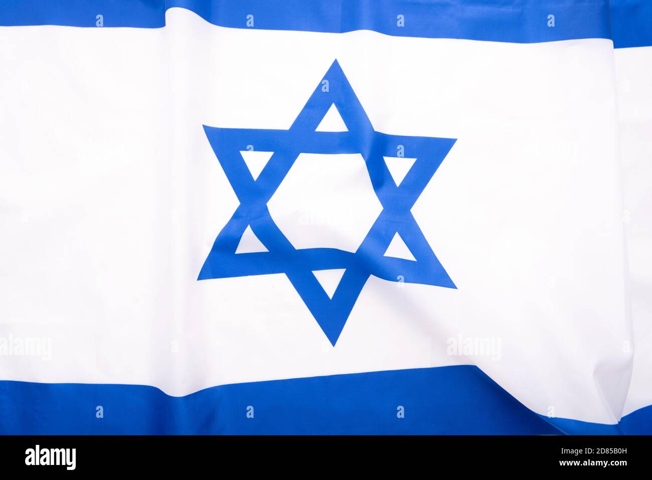 Flagge Israels, Stoff Flagge Zion mit Davidstern als Hintergrund Stockfoto