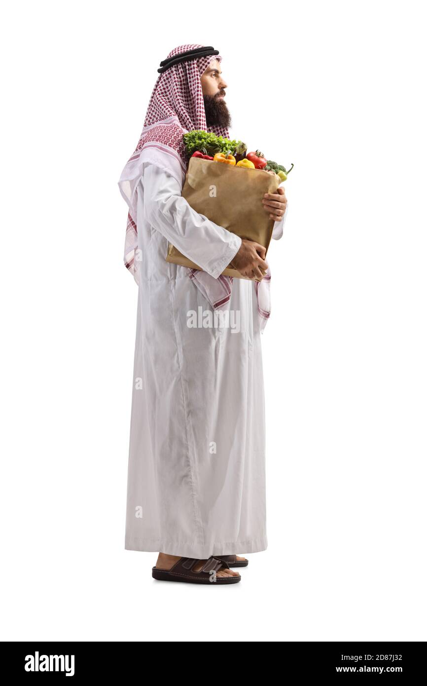 Vollständige Profilaufnahme eines arabischen Mannes mit einem Lebensmittelgeschäft Tasche isoliert auf weißem Hintergrund Stockfoto