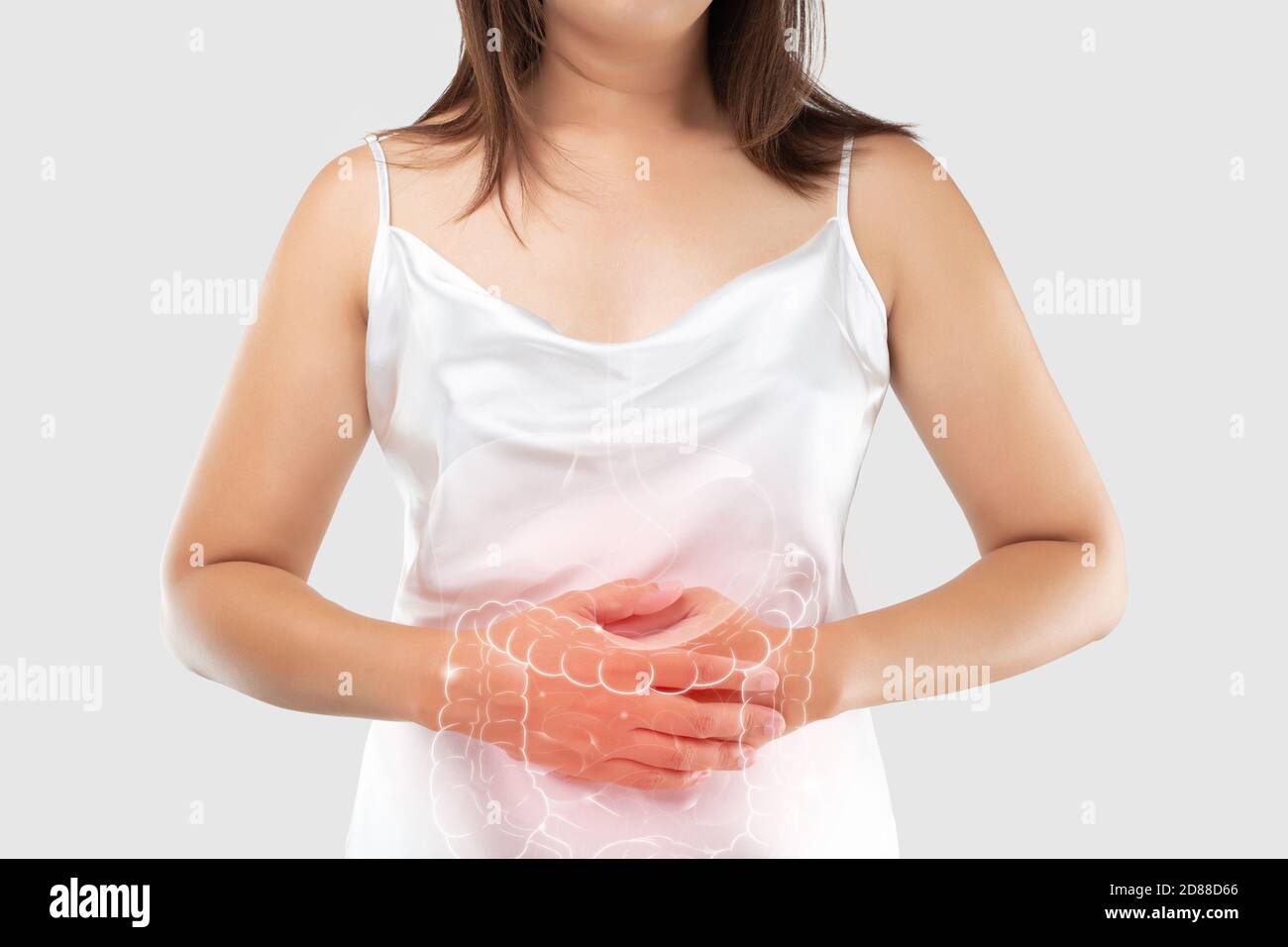 Zeichnung des Dickdarms ist auf dem Körper der Frau, auf einem grauen Hintergrund. Lebensmittelvergiftung und Enteritis. Reizdarmsyndrom Stockfoto