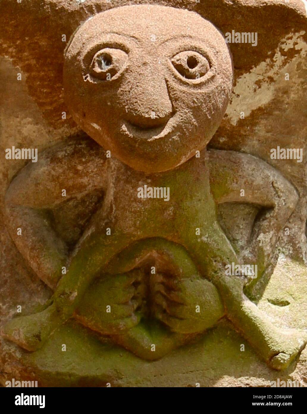 Dieser außergewöhnliche sheela-na-Gig ist in der Church of St Mary and St David in Kilpeck, Herefordshire, zu finden Stockfoto