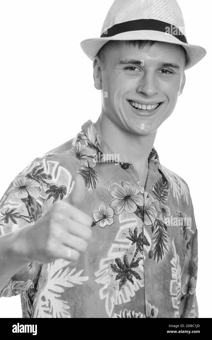 Junge glücklich kaukasischen Mann lächelnd und Daumen hoch Stockfoto