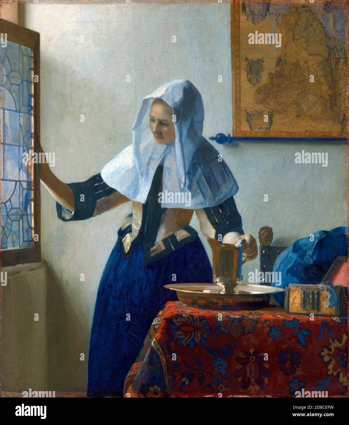 Titel: Junge Frau mit Wasserkrug Ersteller: Johannes Vermeer Datum: 1662 Medium: Öl auf Leinwand Maße: 40.6 x 45.7 cm Ort: Metropolitan Museum of Art Stockfoto