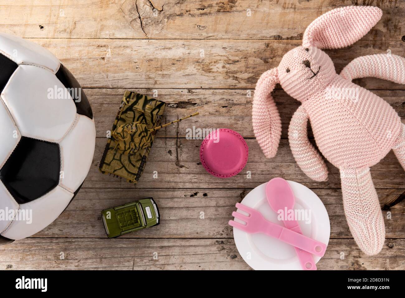Geschlecht Stereotyp Spielzeug auf Holzhintergrund Stockfoto
