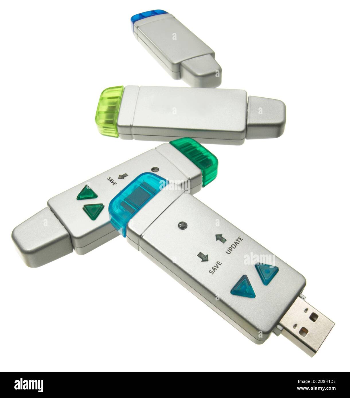 Vier mehrfarbige usb-Cellstick-Flash-Laufwerke auf einem weißen fotografiert Hintergrund Stockfoto