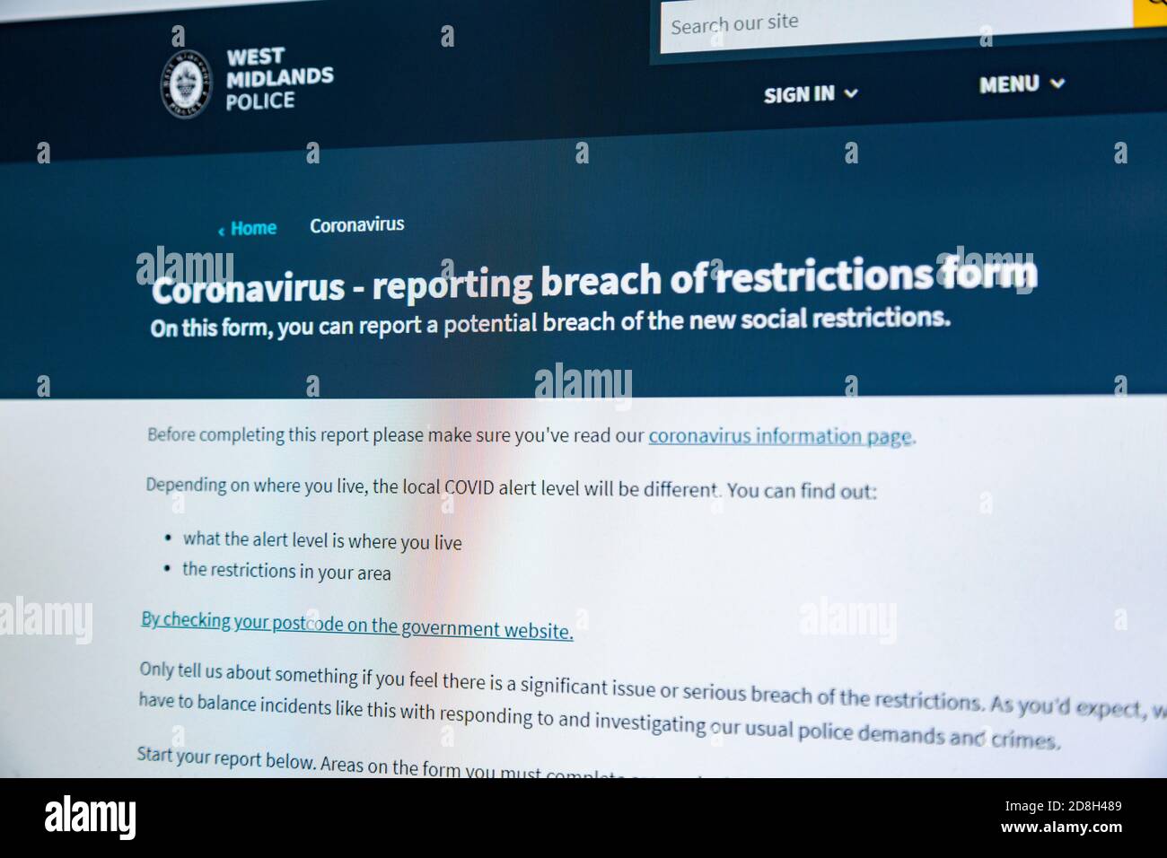 Polizei Website Beratung - Melden eines Verstoßes gegen Coronavirus restrictiopns Formular Stockfoto