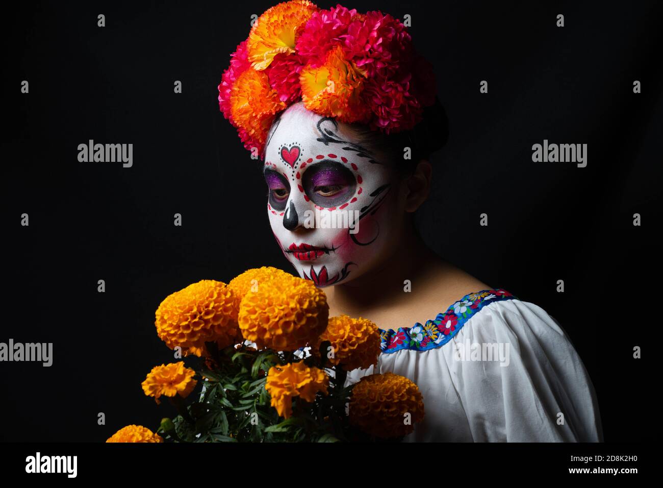 Mädchen personifiziert als catrina Stockfoto