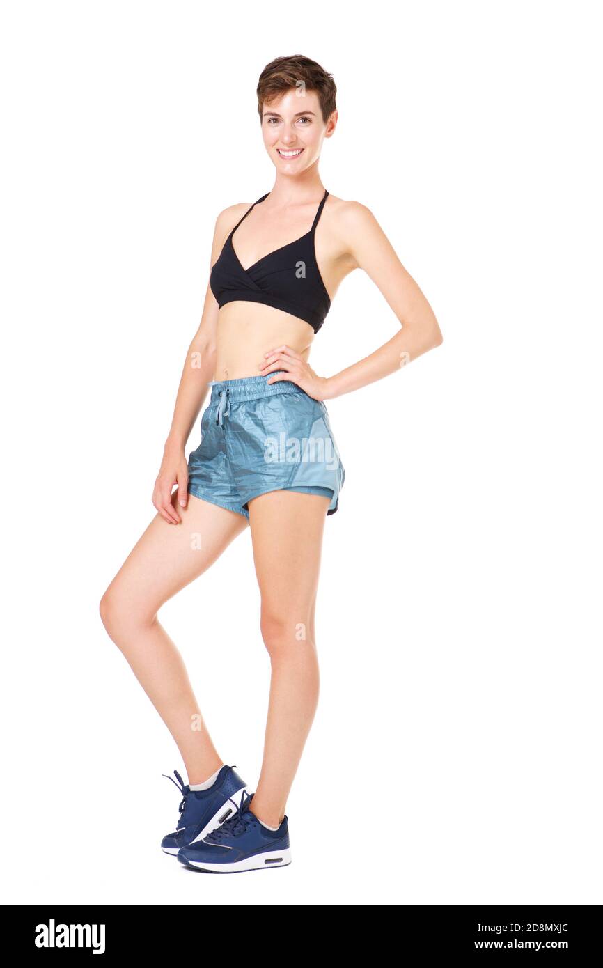 Ganzkörperportrait von gesunden jungen fit Frau gegen isoliert Weißer Hintergrund Stockfoto