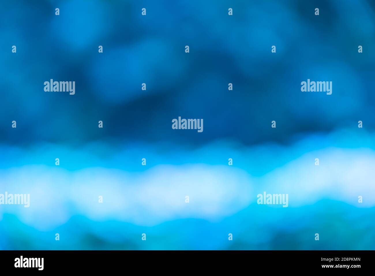 Blauer Bokeh-Hintergrund oder Hintergrund mit Unschärfe-Effekt Stockfoto