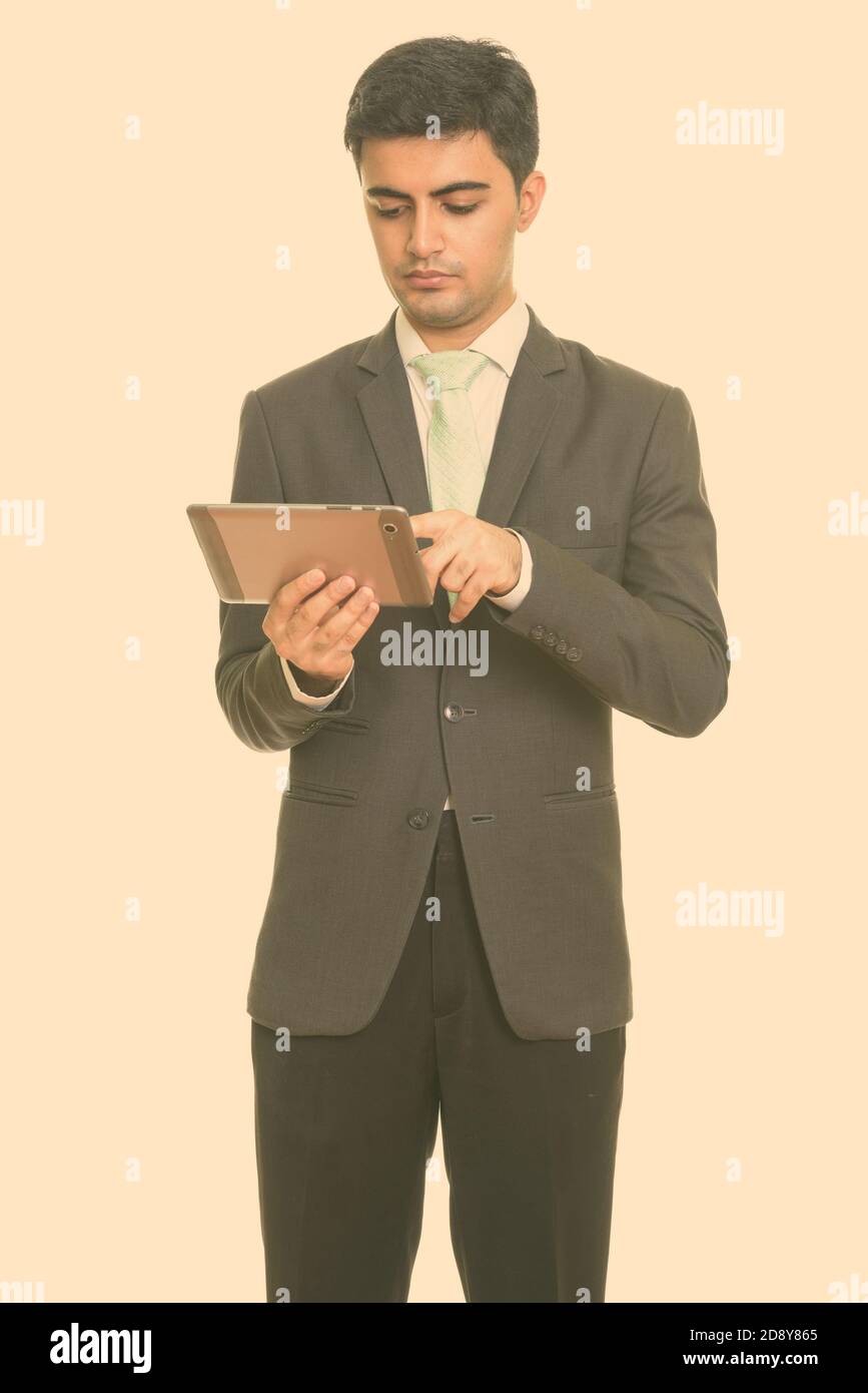 Jungen schönen persischen Geschäftsmann mit digitalen Tablet Stockfoto