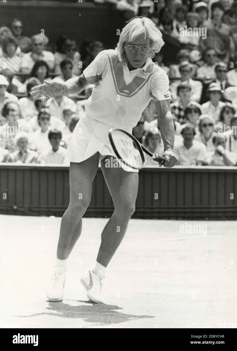 Martina Navratilova of the United States makes a backhand return