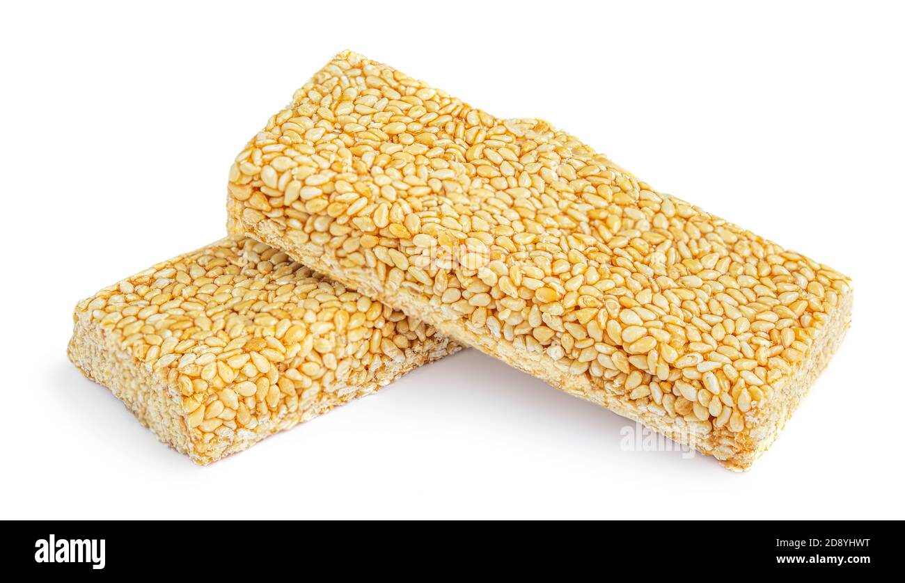 Nut Bars isoliert auf weißem Hintergrund. Seasame Müsliriegel mit Granola Energy Stockfoto