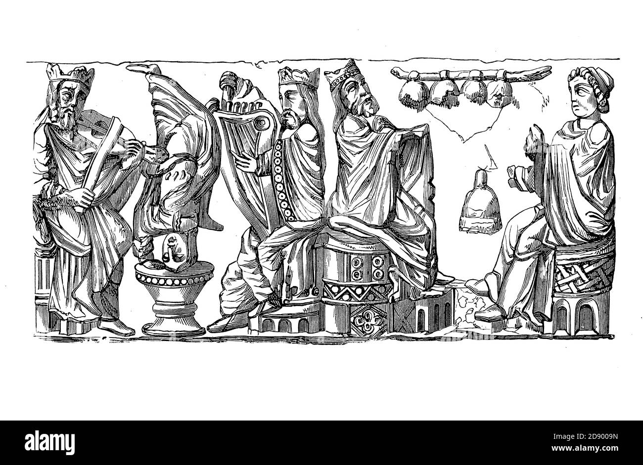 Mittelalterliche musikalische Darbietung: Edle Figuren, die Streichinstrumente und Glocken spielen, und ein Scherzschnitt auf dem Kopf, Basrelief aus dem 11. Jahrhundert Stockfoto