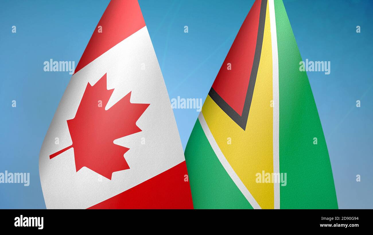 Kanada und Guyana zwei Flaggen Stockfoto