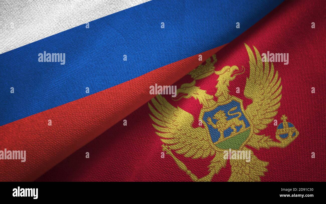 Russland und Montenegro zwei Flaggen Textiltuch, Stoff Textur Stockfoto