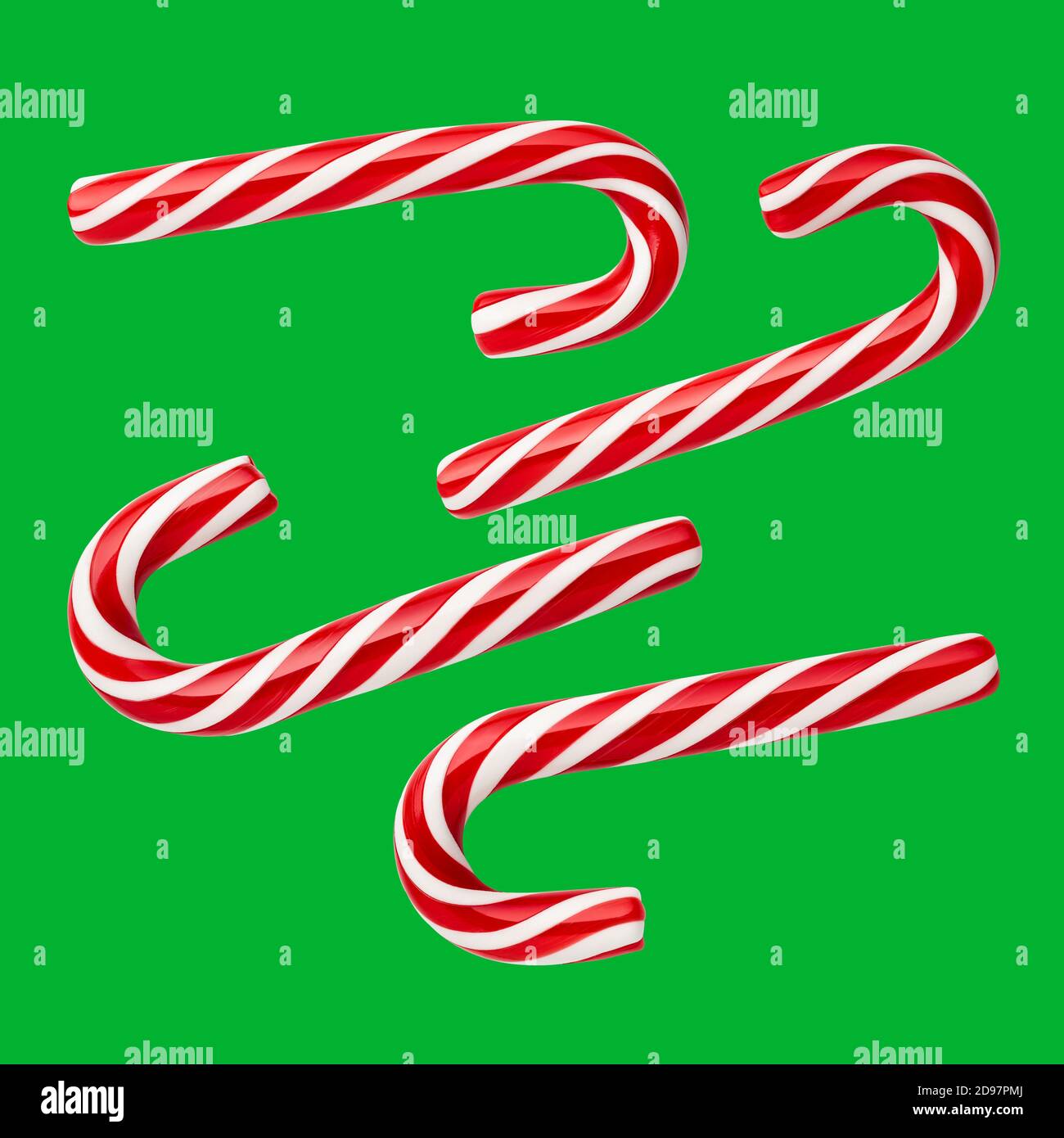 Weihnachtsbonbons - handgemachte Pfefferminzbonbons. Set von festlichen Süßigkeiten auf einem grünen (chromakey) Hintergrund Stockfoto