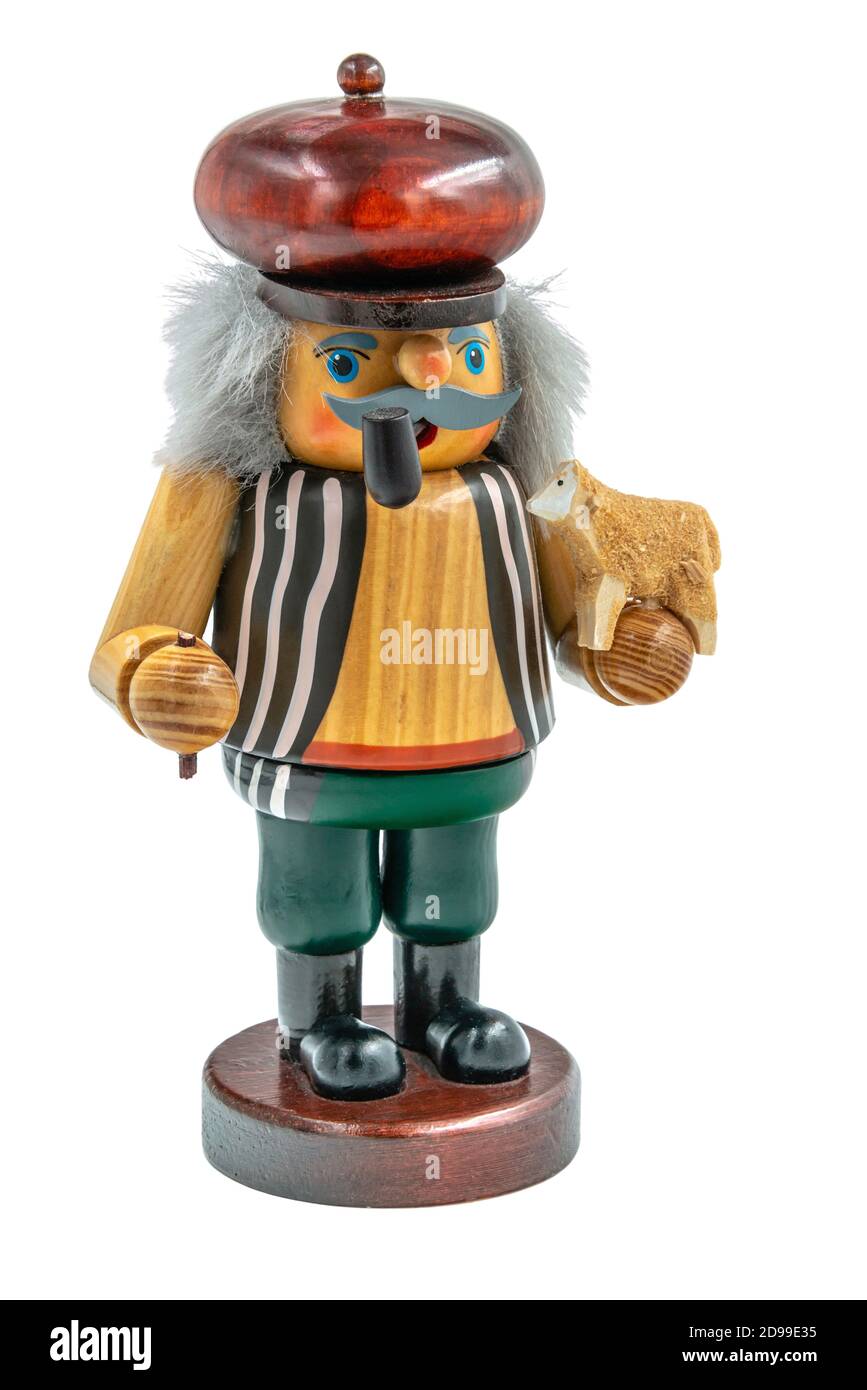 Original geschnitzte hölzerne deutsche Weihnachten Smoking man Figur ausgeschnitten Auf weißem Hintergrund Stockfoto