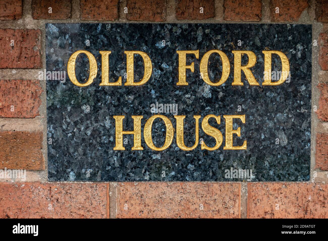 Gold Schriftzug auf Marmor Haus Namensschild Stockfoto