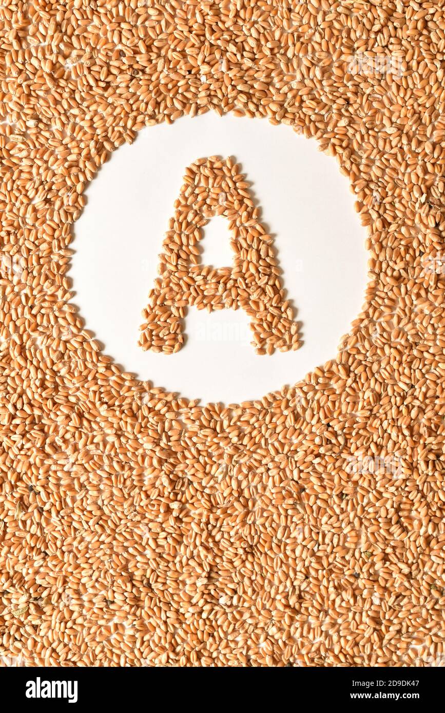 Vitamin EIN Zeichen aus Weizen auf Vollbildabdeckung Stockfoto