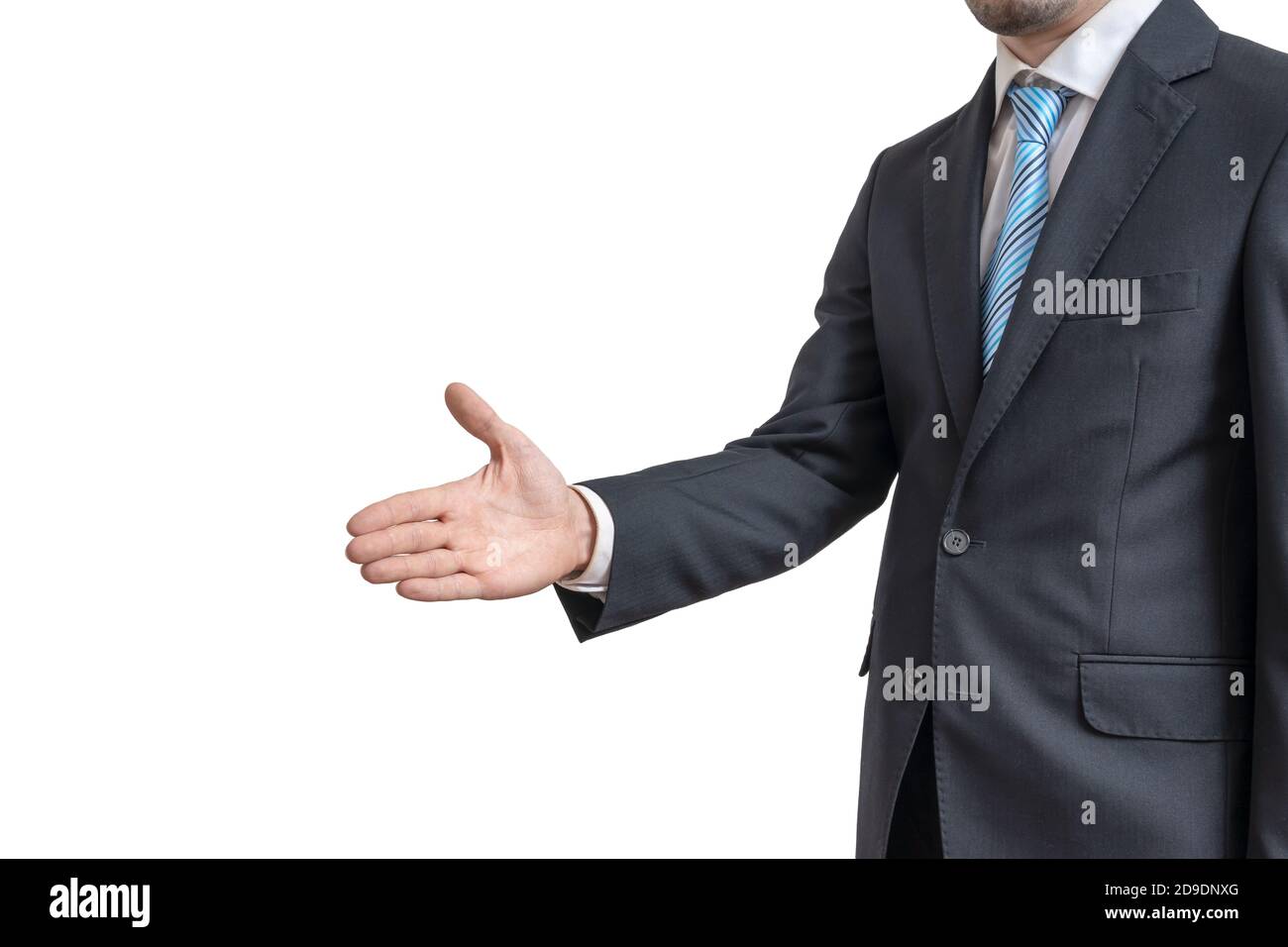 Der junge Mann im Anzug bietet Hand zum Händeschütteln an. Isoliert auf weißem Hintergrund. Stockfoto