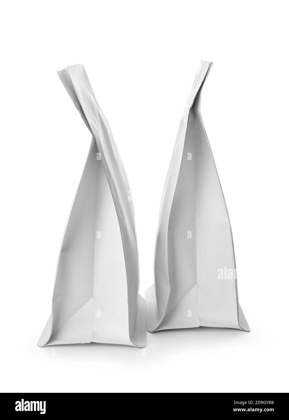 Leere Kaffeetaschen auf weißem Hintergrund Stockfoto