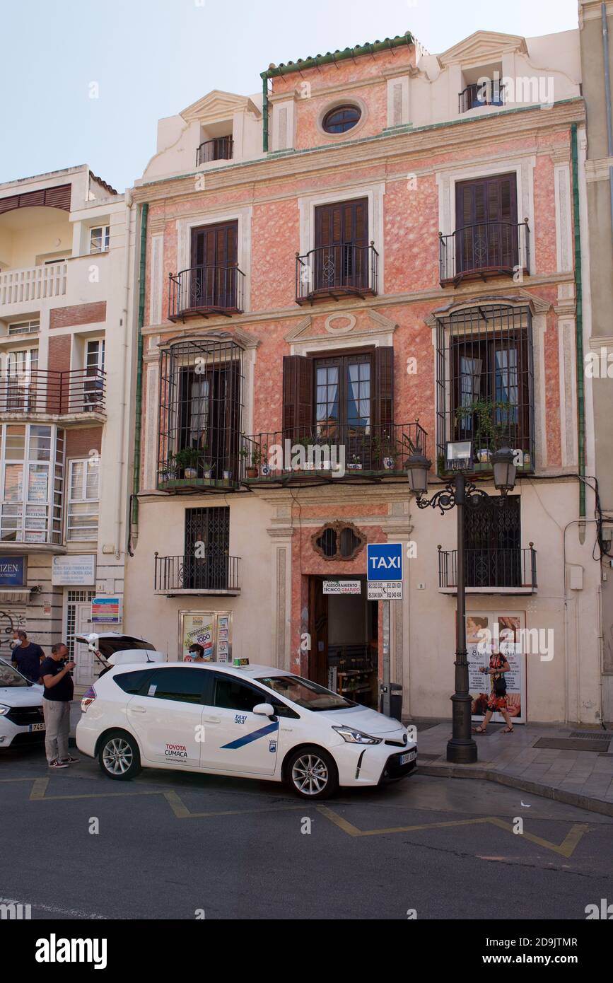Taxi in einer Straße in Malaga Stockfoto