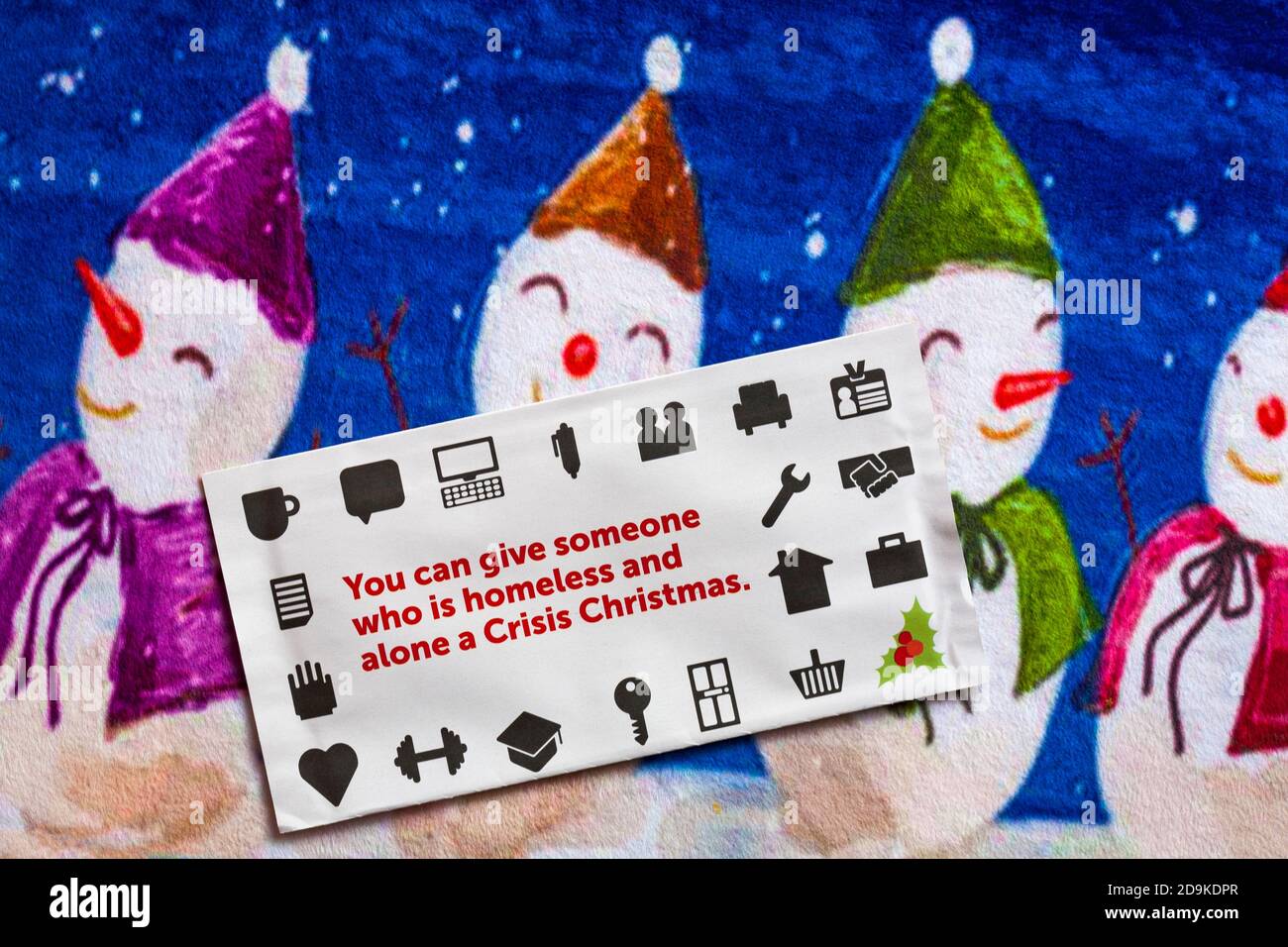 Post on Christmas mat - Charity Appell, Krise Sie können jemandem, der obdachlos ist und allein eine Krise Weihnachten Stockfoto