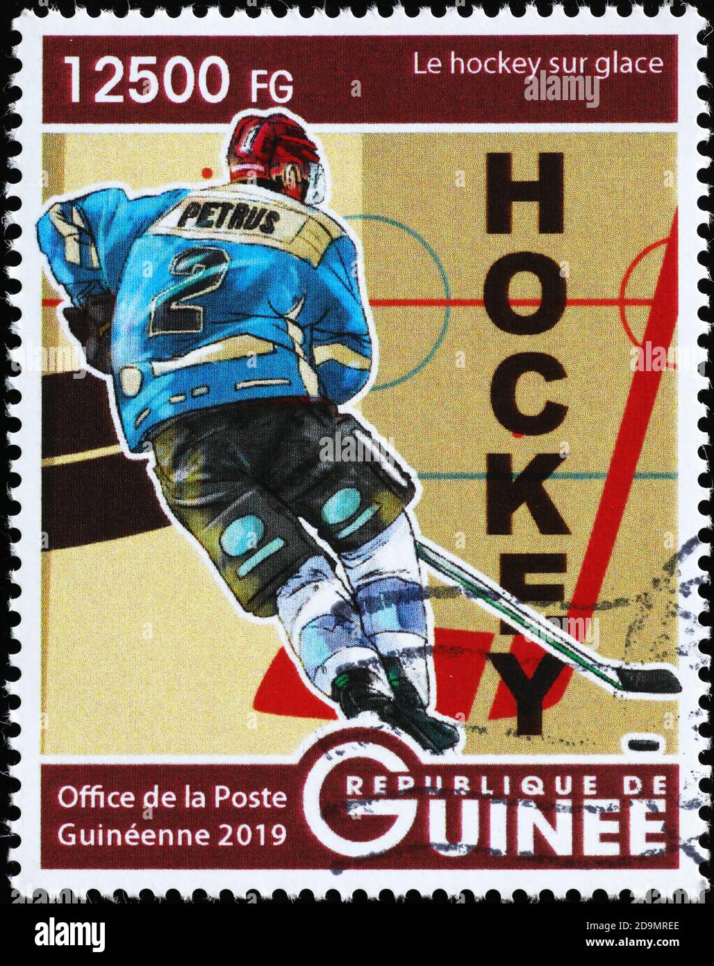 Hockeyspieler in Aktion auf Briefmarke Stockfoto