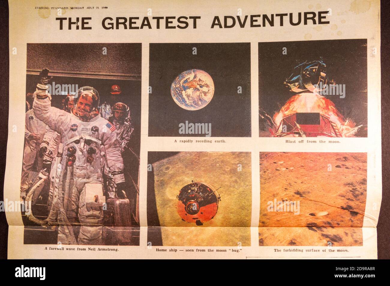 Verschiedene Fotos in einer Evening Standard Souvenir Zeitung (Replik) für die Apollo 11 Mondlandungen am 21. Juli 1969. Stockfoto