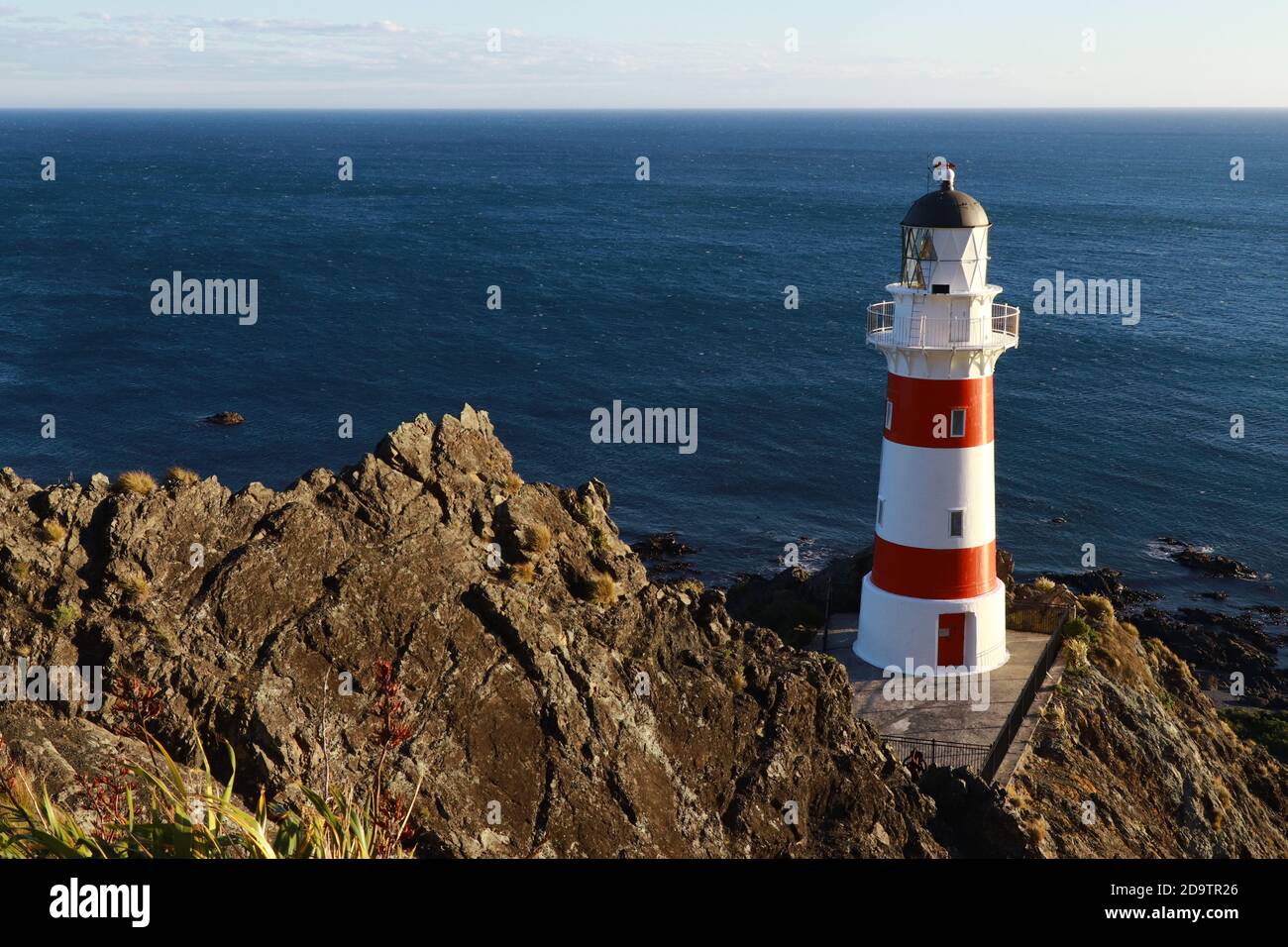 Schöner Sonnenuntergang am Cape Palliser, Leuchtturm, Nordinsel von Neuseeland Stockfoto