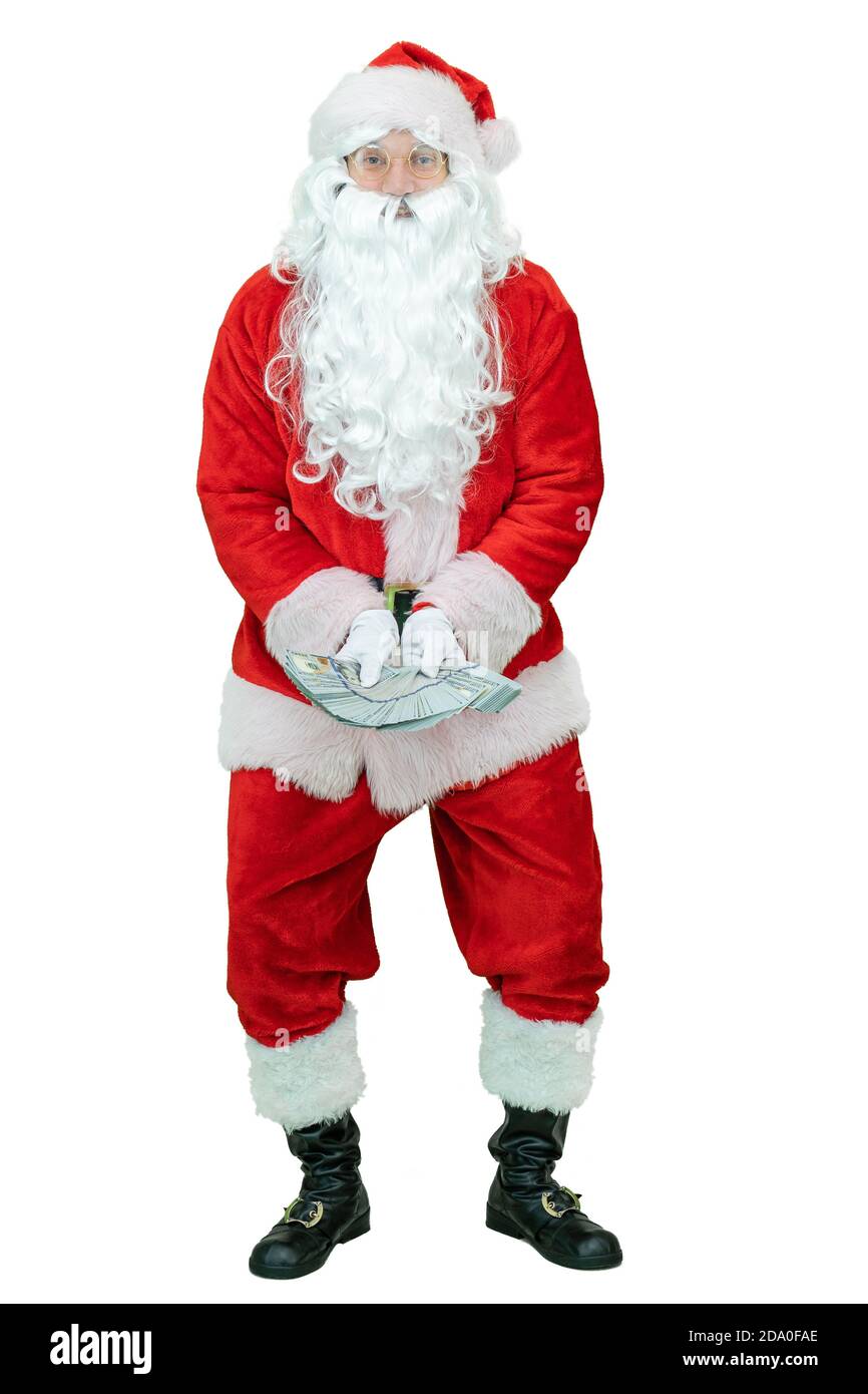 Santa hält Fan von Dollar Geldscheine. Der Weihnachtsmann hält Dollargeldscheine auf weißem Hintergrund. Weihnachten steht bevor Stockfoto