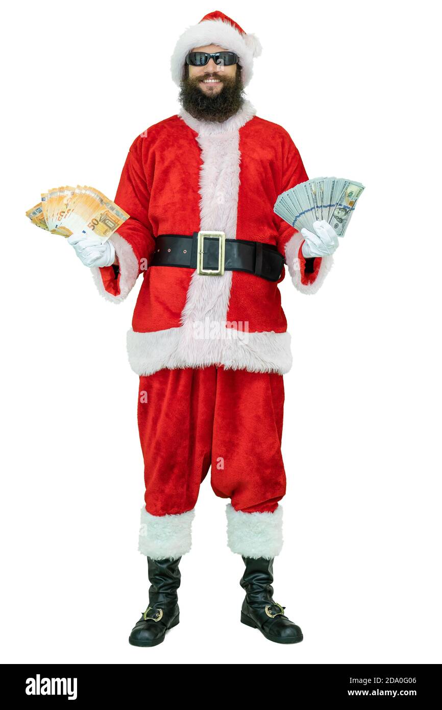 Arabischer Weihnachtsmann mit schwarzem Bart hält Fan von Euro und Dollar, zeigt Daumen Finger nach oben. Der Weihnachtsmann hält Euro- und Dollar-Banknoten auf Weiß Stockfoto